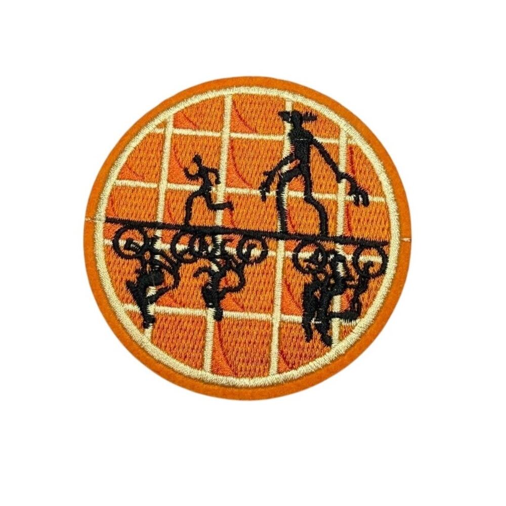 Upside down iron on patch orange and black
